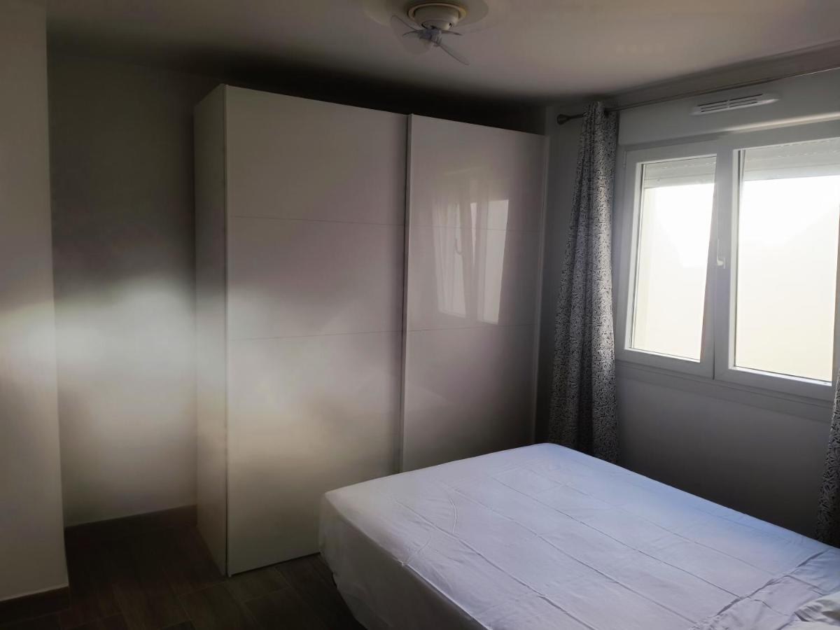 En Playa Bajondillo, Apartamento