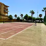 First Line Beach, Tenniscourt And Pool